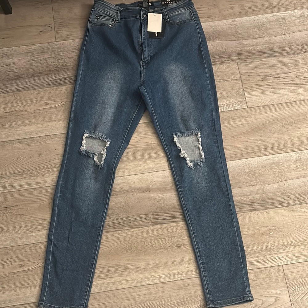 Distressed Blue Jeans